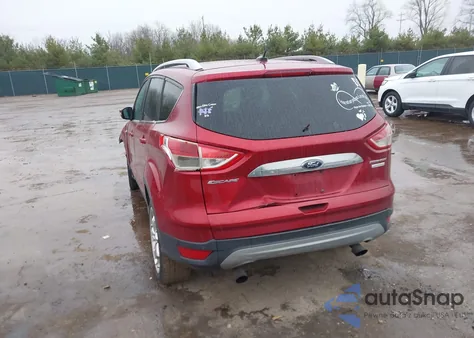 2014 Ford Escape Titanium z USA, uszkodzony, nr VIN 1FMCU0J96EUD93271